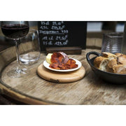 Staub | Magnetic Trivets - Oval 11.25 crafted from hardwood, designed for STAUB Cocottes, offering heat resistance and surface protection for seamless oven-to-table transitions.