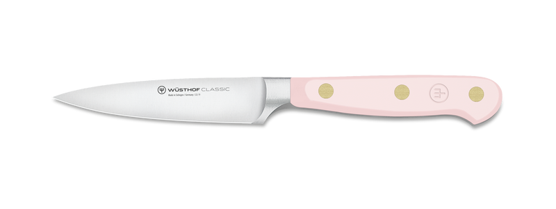 Wüsthof | Classic 3.5 Paring knife with pink handle, featuring a slim, pointed blade ideal for trimming and peeling small produce like garlic and herbs.