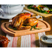 J.K. Adams | Turnabout Reversible Carving Board, 20x14 Cherry, features a cradle for roasts and a flat side with a juice groove for versatile kitchen use.