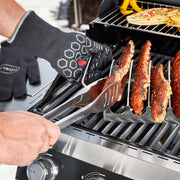 Rösle Premium Grill Gloves showcasing flame-retardant META aramid fibers and extra long cuffs, designed for heat protection and optimum handling, suitable for grilling enthusiasts.