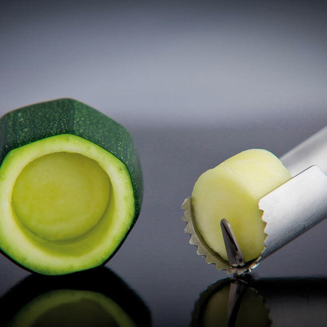 de Buyer | Universal Corer - Red, featuring a stainless steel corer with an ergonomic handle, designed for efficient fruit and vegetable coring.