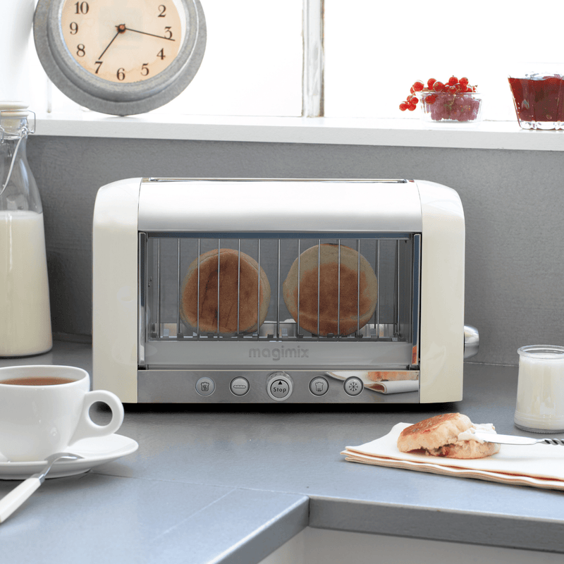 Magimix | Vision Toaster - Cream features see-through glass panels for monitoring toast, with adjustable browning levels and pre-set functions for versatile breakfast preparation.