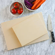 Capabunga | Perfect Prep Cutting Boards - Large, featured with kitchen ingredients, highlighting its durable, non-porous surface ideal for professional and home kitchens.