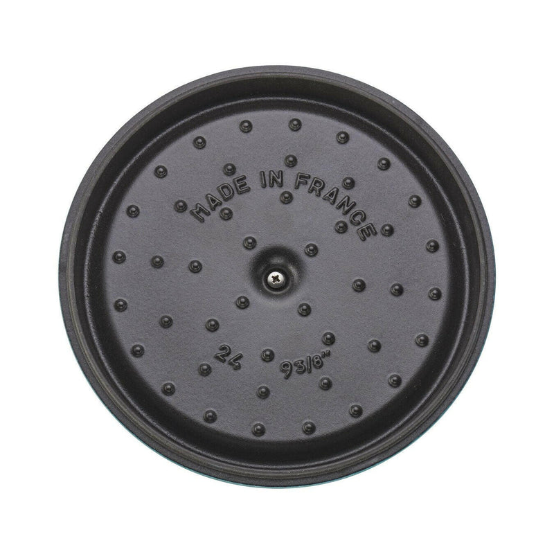 Staub | Round Cocottes - 9 qt - Lilac, a durable cast iron pot ideal for slow-cooking, features a self-basting lid for moist, flavorful dishes.