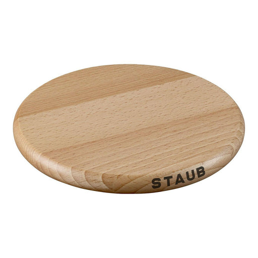 Staub | Magnetic Trivets - Round 9 crafted from hardwood, designed for STAUB Cocottes, enhancing dining elegance while protecting surfaces with heat resistance up to 200°C.