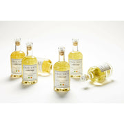 Gris Gris | Cocktail Magic Simple Syrup - Yuzu Serrano bottles, showcasing small-batch mixers with aromatic herbs and peppers, ideal for elevating cocktails or mocktails.