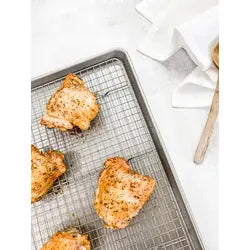 Extra large sheet pan with a steel cross-wire baking rack, ideal for evenly baking cookies and scones, part of Athens Cooks' curated kitchen tools.
