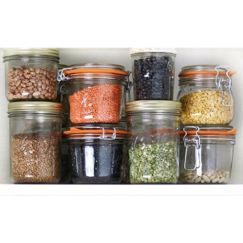 Le Parfait Super Jars - 1L displayed on a shelf, each filled with dried legumes, showcasing airtight storage for preserving and organizing kitchen essentials.