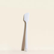 GIR | Skinny Spatula - Studio White, a sleek kitchen tool with antimicrobial unibody design, ideal for precise cooking tasks.