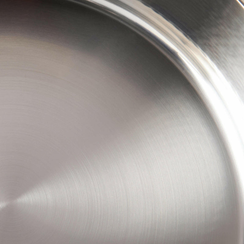 Ruffoni Symphonia Cupra Saucepans - 3.5 Quart, showcasing a close-up of its hammered copper surface and stainless steel interior, highlighting craftsmanship and functionality.