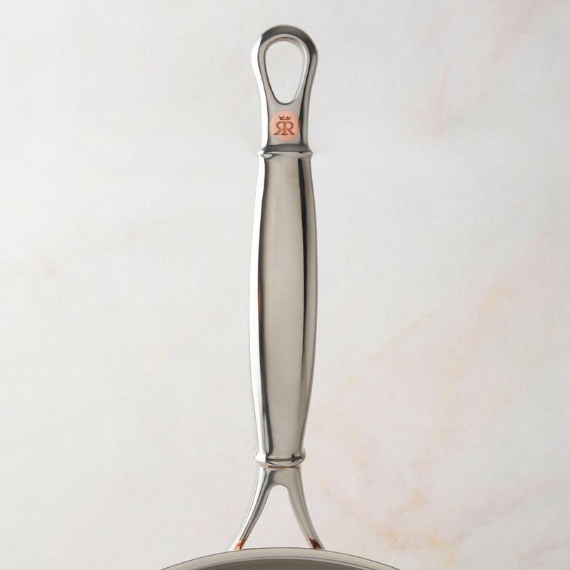 Ruffoni Symphonia Cupra 3.5 Quart Saucepan, featuring ergonomic stainless-steel handles and a hammered copper design, ideal for simmering and boiling.