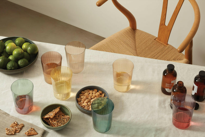 Set of four LSA International Gems Tumblers, each with a fluted texture, hand-painted to resemble polished gemstones, ideal for various occasions.