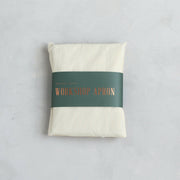 The Floral Society | Canvas Workshop Apron - Natural, pure cotton, cross-back design with wide front pockets, ideal for kitchen, garden, or studio tasks.