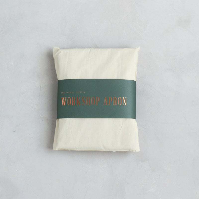 The Floral Society | Canvas Workshop Apron - Natural, pure cotton, cross-back design with wide front pockets, ideal for kitchen, garden, or studio tasks.