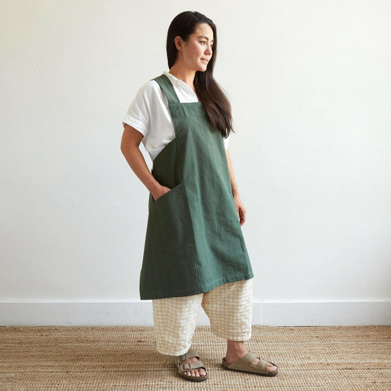 The Floral Society | Canvas Workshop Apron - Fern: Pure cotton, cross-back apron with wide front pockets, designed for versatility in garden, kitchen, or studio environments.
