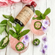 El Guapo | Craft Cocktail Syrups - Almond Orgeat in a sleek bottle, perfect for enhancing cocktails with its unique almond flavor, ideal for mixology enthusiasts.