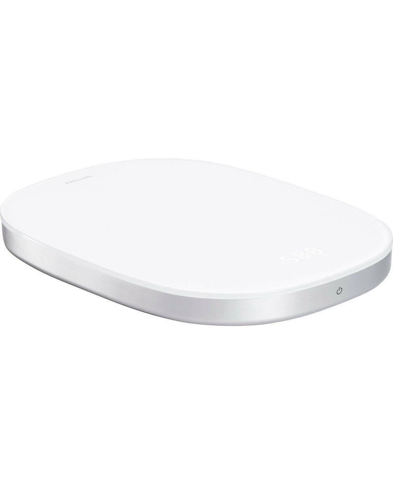 Zwilling Digital Kitchen Scale - Silver with seamless glass surface, concealed display, and tare function, ideal for precise measurements up to 22lb, includes rechargeable battery and USB cable.