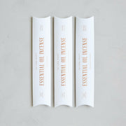 The Floral Society's handcrafted essential oil incense, featuring earthy and citrusy Cedar Wood & Palo Santo, displayed in packaging with 20 sticks for calming ambiance.