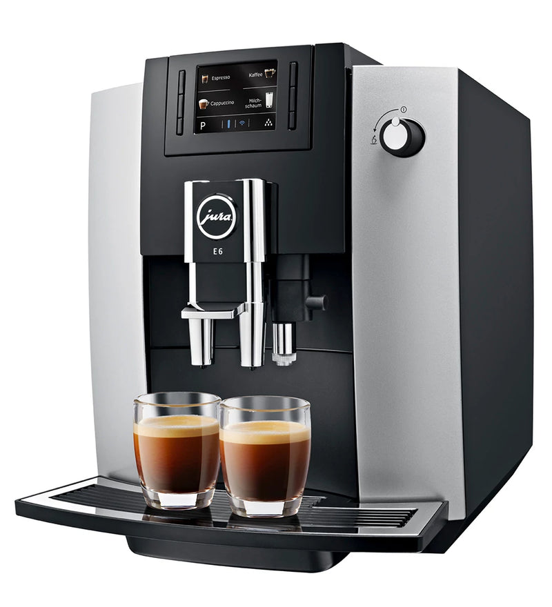 JURA E6 Coffee Machine, featuring AromaG3 grinder and Pulse Extraction Process for superior coffee quality, displayed with user-friendly TFT color display and interchangeable milk spout.