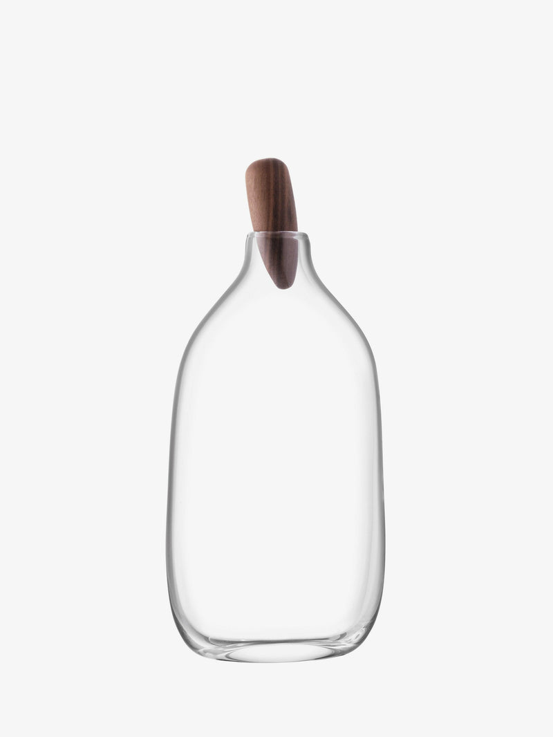 LSA International Float Decanters with walnut stoppers, showcasing sleek, mouth-blown glass design, ideal for enhancing any home bar setup.