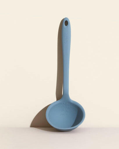 GIR | Ultimate Ladle - Navy with ergonomic handle, precision pouring edge, and embossed measurements, ideal for versatile kitchen tasks.