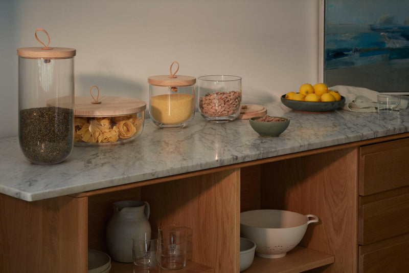 LSA International Ivalo Container with Ash Lid, 6x6, 57 oz, featuring a mouth-blown glass body, sustainably-sourced ash lid, and leather toggle, ideal for versatile storage.