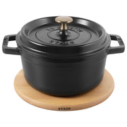 Staub | Magnetic Trivets - Oval 11.25 crafted from hardwood, designed for STAUB Cocottes, seamlessly attach for stylish, heat-resistant dining.