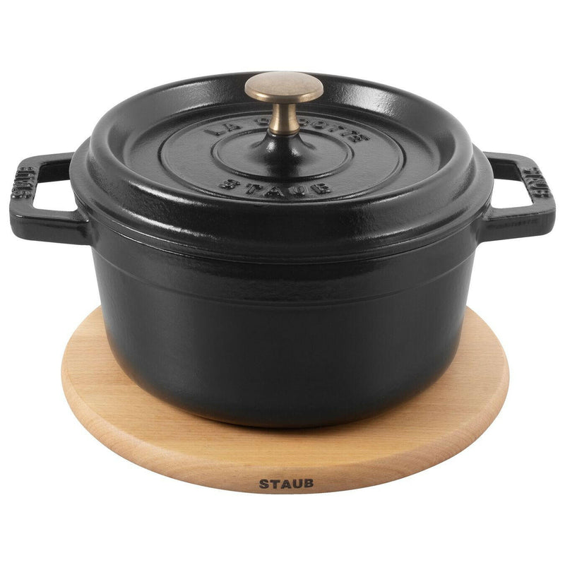 Staub | Magnetic Trivets - Oval 11.25 crafted from hardwood, designed for STAUB Cocottes, seamlessly attach for stylish, heat-resistant dining.