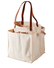 CapaBunga Market Tote - Natural, featuring brown handles and straps, perfect for secure grocery trips with multiple compartments and a vegan leather base for stability.