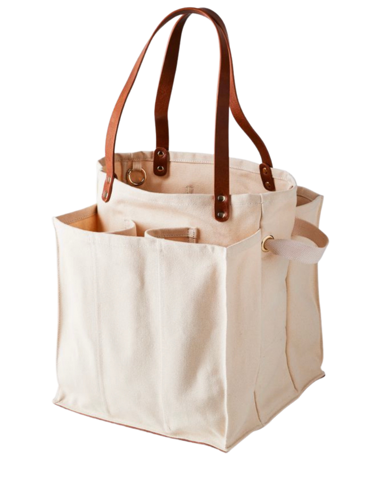 CapaBunga Market Tote - Natural, featuring brown handles and straps, perfect for secure grocery trips with multiple compartments and a vegan leather base for stability.