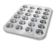 Mini muffin pan with 24 cavities, crafted from heavy-gauge aluminized steel, featuring Americoat nonstick coating for easy release and cleanup. Ideal for baking bite-sized treats.