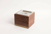 Alabama Sawyer Noaway Countertop Compost Bin, a wooden box with a metal lid, designed for discreet kitchen composting.