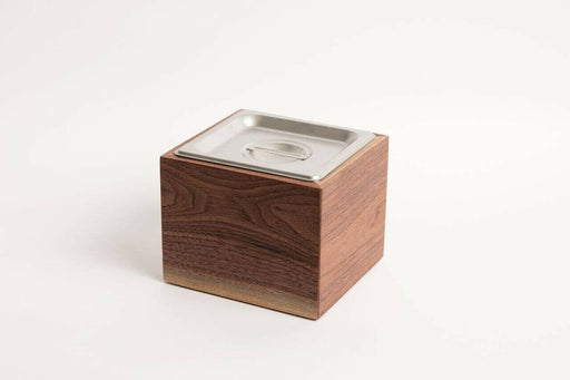 Alabama Sawyer Noaway Countertop Compost Bin, a wooden box with a metal lid, designed for discreet kitchen composting.