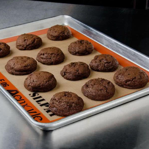 Silpat Nonstick Baking Mats in various sizes featuring reinforced fiberglass mesh, ideal for replacing oils and sprays, perfect for effortless baking.