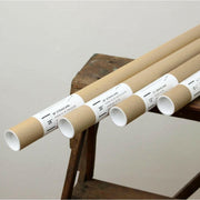 Earth & Nest | Oak Poster Hanger - Large; close-up of oak hanging bar with magnetic grips, ideal for displaying posters or prints.