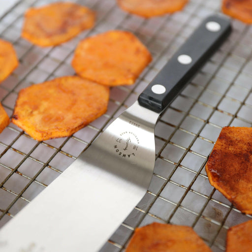 Lamson's 3 x 5 rectangular turner with POM handle, showcasing its high-quality craftsmanship and versatility for various cooking tasks, perfect for Athens Cooks' kitchen collection.