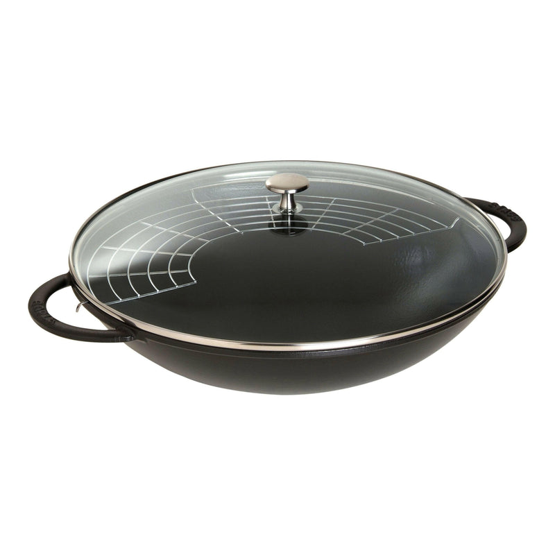 STAUB Perfect Pan - 14.5 inch Matte Black: A versatile cast iron wok with angled sides, glass lid, and metal rack for varied cooking techniques.
