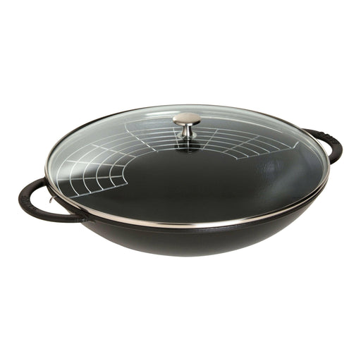 STAUB Perfect Pan - 14.5 inch Matte Black: A versatile cast iron wok with angled sides, glass lid, and metal rack for varied cooking techniques.