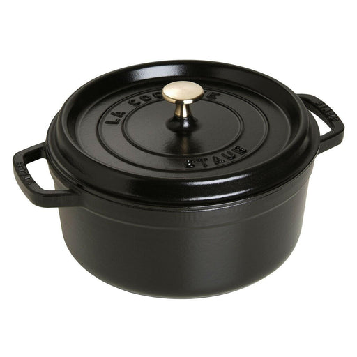 Staub Round Cocotte 9 qt in Lilac, a versatile cast iron pot ideal for slow-cooking, with a self-basting lid, perfect for kitchen-to-table presentations.