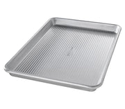 USA Pan | Sheet Pans - Half Sheet Pan, ideal for toaster ovens, features a fluted design and nonstick coating, perfect for baking cookies and roasting vegetables.