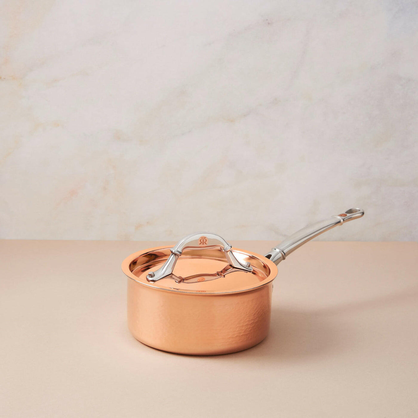 Ruffoni | Symphonia Cupra Saucepans - 1.5 Quart: A hammered copper saucepan with a lid and ergonomic handle, ideal for small portions and enhancing kitchen elegance.