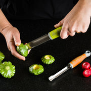 de Buyer | Universal Corer - Red, featuring stainless steel construction and ergonomic handle, ideal for effortlessly coring fruits and vegetables with patented pull technology.