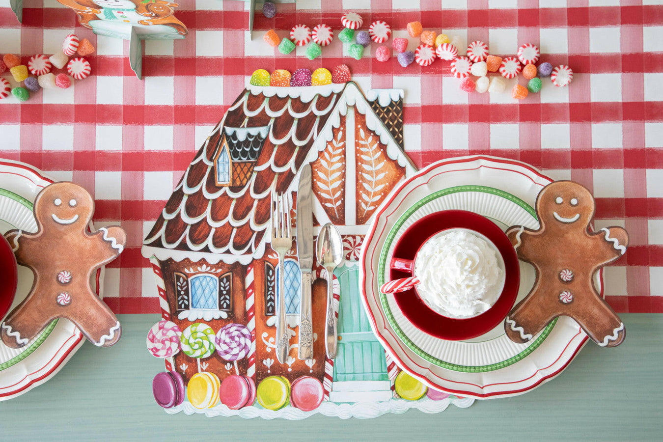 Hester & Cook Gingerbread Cocktail Napkins from the Winter Holiday Collection, featuring whimsical holiday motifs perfect for festive table settings.