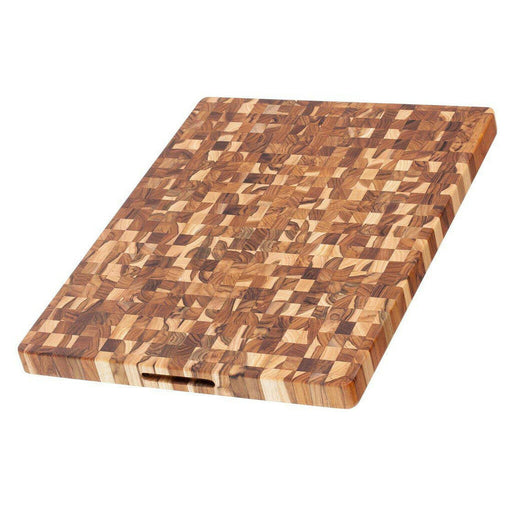 Teakhaus | Butcher Block Rectangle Cutting Board, 18 x 24, featuring end grain teakwood, hand grip, and juice canal. Sustainable, durable, moisture-resistant, perfect for Athens Cooks enthusiasts.