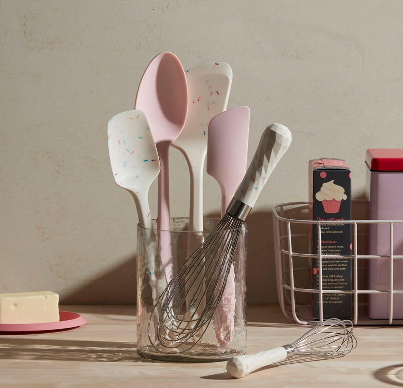 GIR | Ultimate Spoonula - Navy displayed in a glass container with other utensils, highlighting its versatile design for scraping, scooping, and serving in the kitchen.