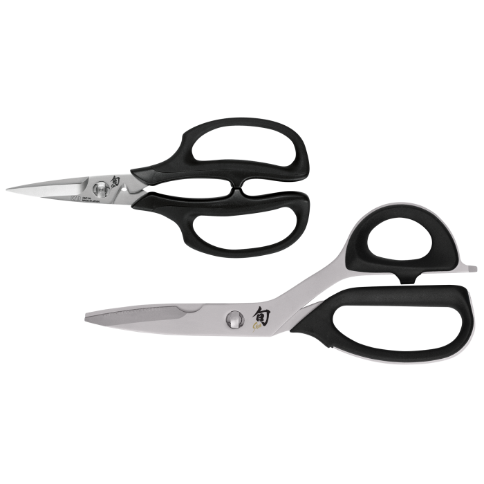 Shun Kitchen Herb Shears, 7.5 inches, featuring stainless-steel blades and black ergonomic handles for precise herb cutting. Ideal for kitchen enthusiasts seeking quality tools.