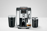 Jura E8 Fully Automatic Espresso + Coffee Machine with sleek design, featuring a TFT display, Professional Aroma Grinder, and automatic milk cleaning system for versatile specialty coffee preparation.