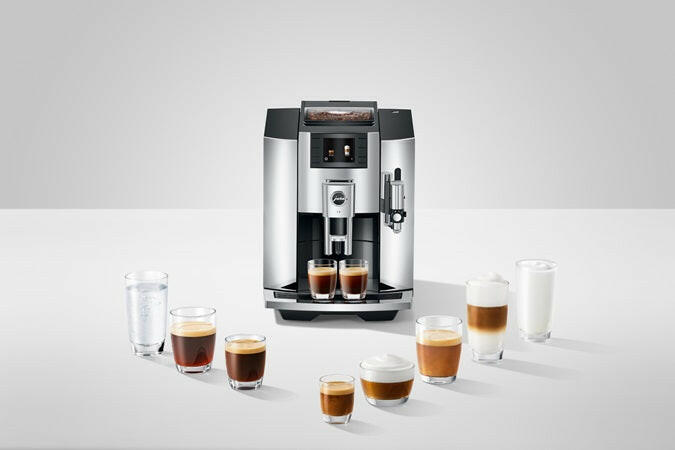 Jura E8 - Fully Automatic Espresso + Coffee Machine, showcasing its sleek design with a Professional Aroma Grinder and TFT display for versatile coffee brewing.