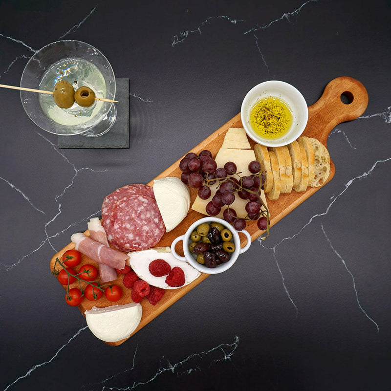 J.K. Adams Maple Artisan Plank Serving Board, featuring an engraved, vintage finish ideal for serving bread and cheeses, reflecting timeless style and practicality.