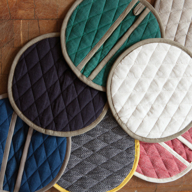 Sir|Madam Linen Pot Holder - Single - Salmon, circular, pocketed design for versatile kitchen use; doubles as a trivet, complements linen napkins.